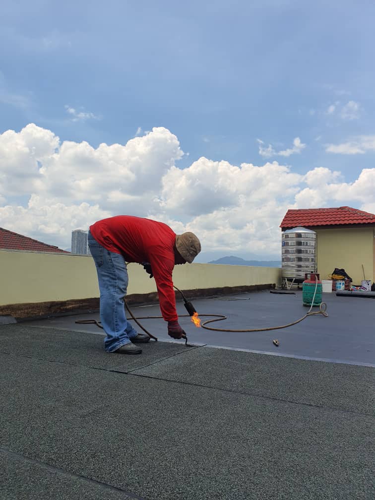 Torch on membrane waterproofing works at residential roof top 4